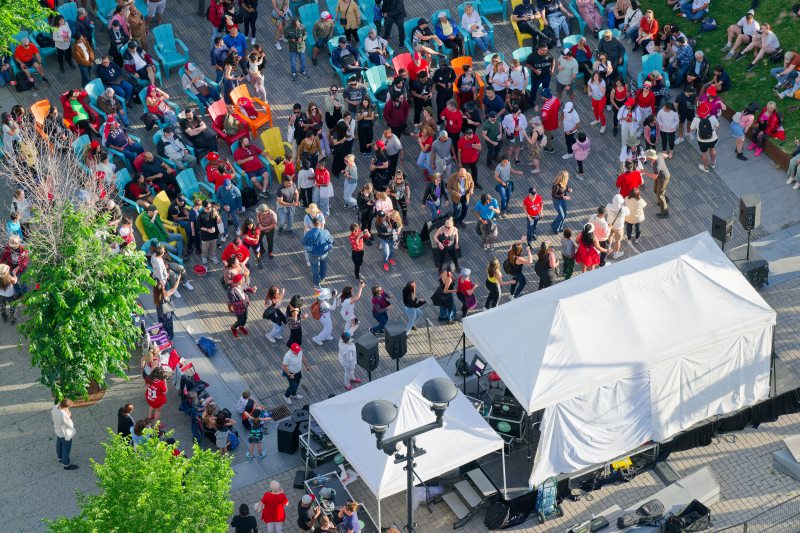 Kids in costumes walking around an event