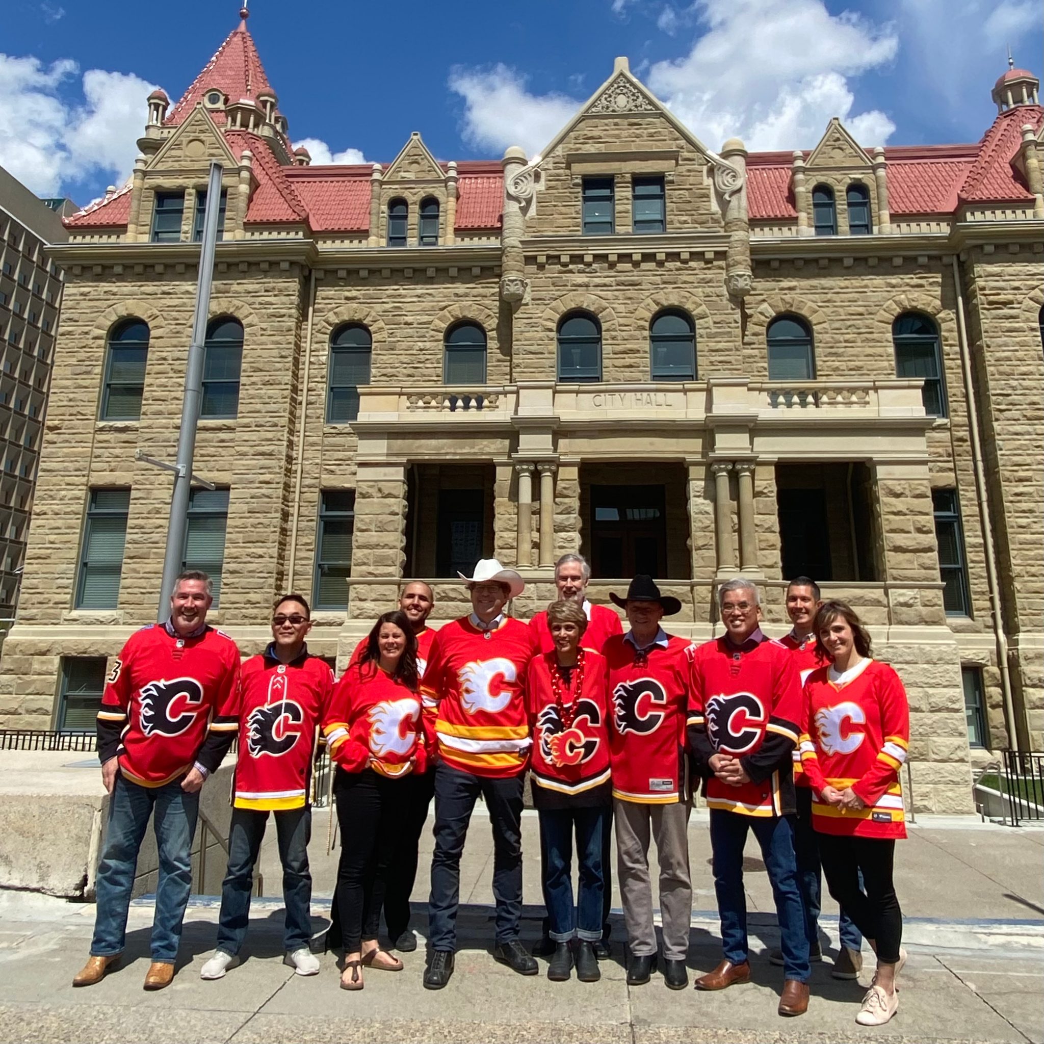 Councillors in Flames jerseys in front of City Hall