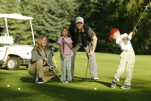 family golfing