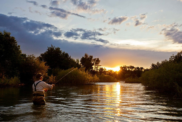 Man fishing in river