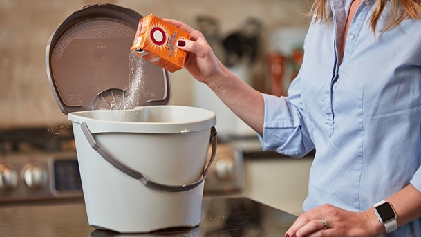 Fill the pail with food scraps