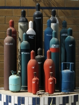 Compressed gas tanks and cylinders