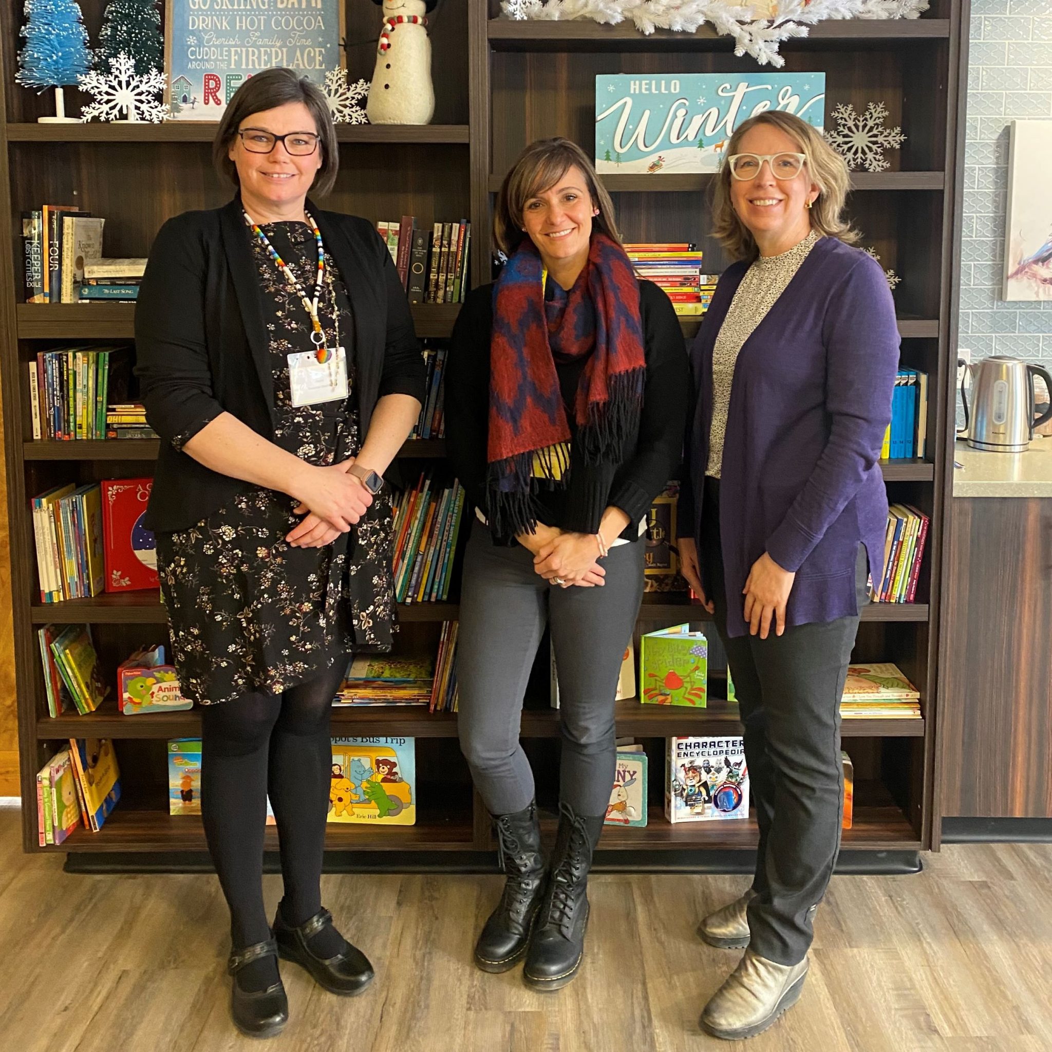 Councillor Sharp with staff from Discovery House: Leslie Hill, Executive Director; and Anita Hofer, Director of Strategy and Communications