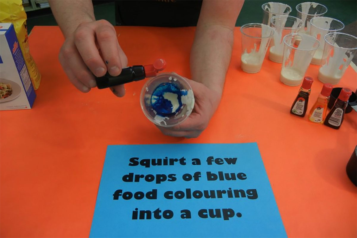 Separate into cups and add a few drops of food colouring